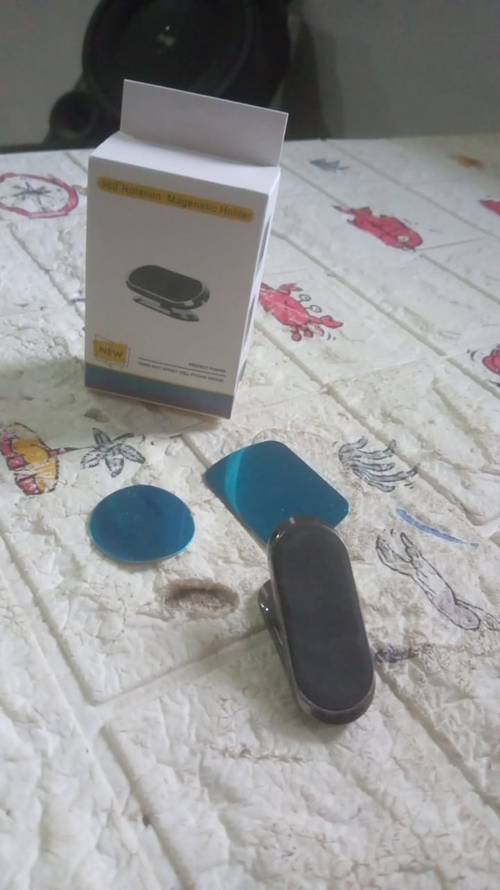 12504 Magnetic Phone Mount/Holder for Car, Super Strong Magnet Universal Car Mount, Dashboard 360° Rotation for Car, Desk, Office, Home & Kitchen for All Smart phones (1 Pc) 12504 Magnetic Phone Mount/Holder for Car, Super Strong Magnet Universal Car Mount, Dashboard 360° Rotation for Car, Desk, Office, Home & Kitchen for All Smart phones (1 Pc)